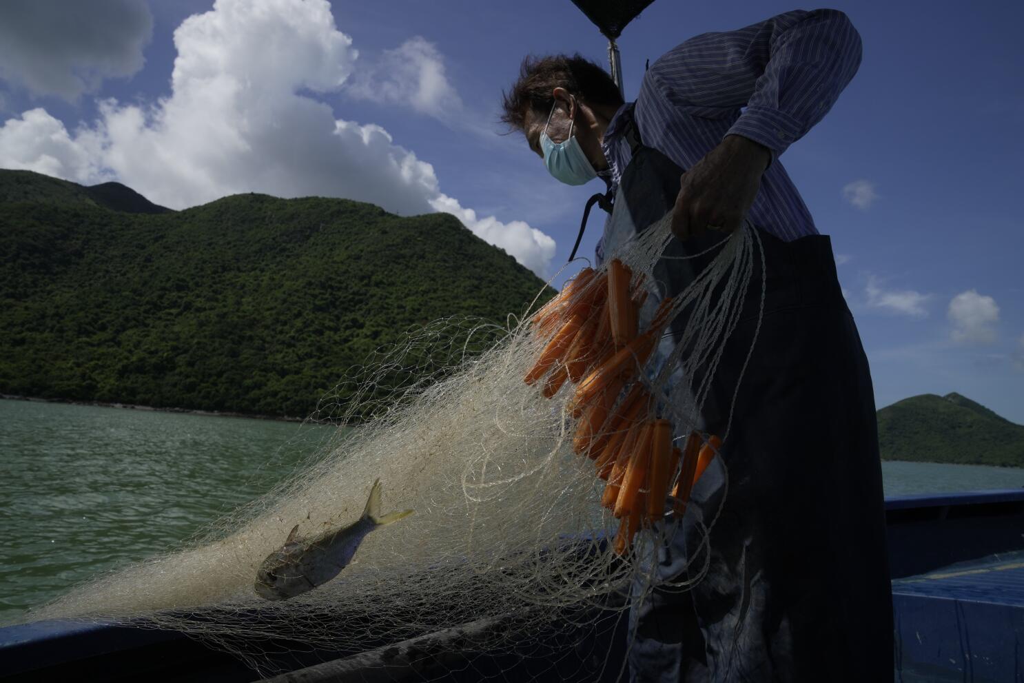A tough crew: Hong Kong fishermen tell their life stories to young  generation