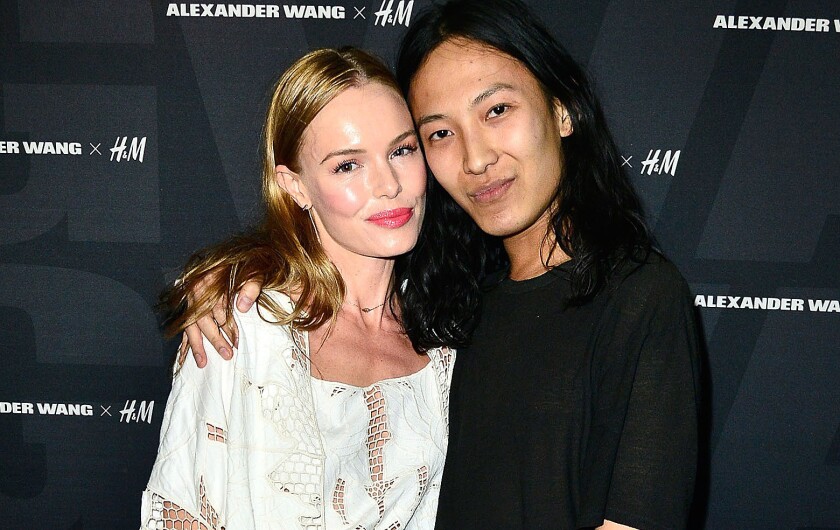 Actress Kate Bosworth and designer Alexander Wang arrive at the Alexander Wang X H&M Coachella Party.