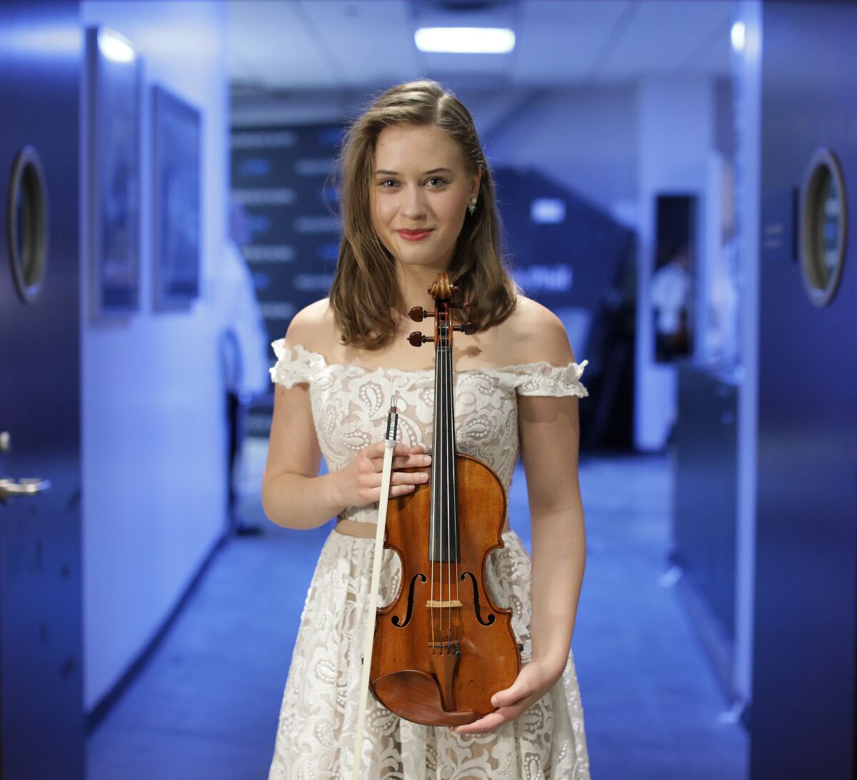 18-year-old Play With Ray contest winner Laura Kukkonen of Helsinki poses with her violin.