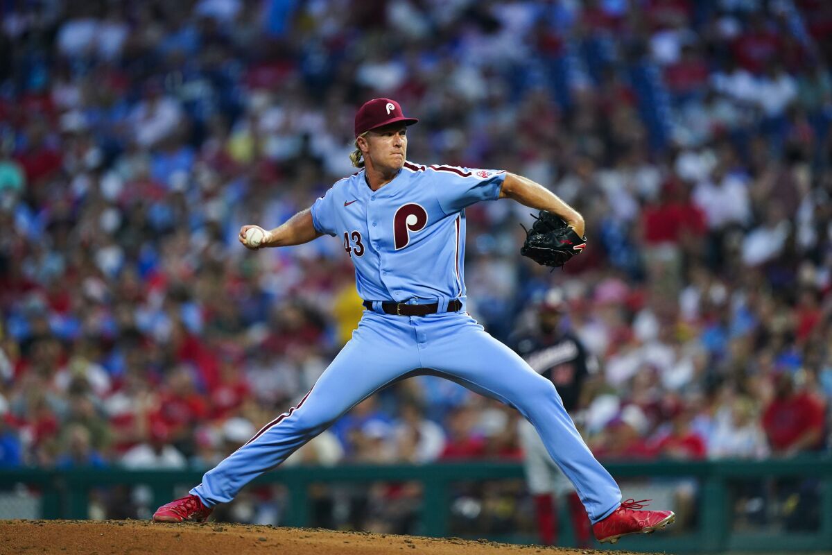 Syndergaard wins rain-shortened debut as Phillies beat Nationals