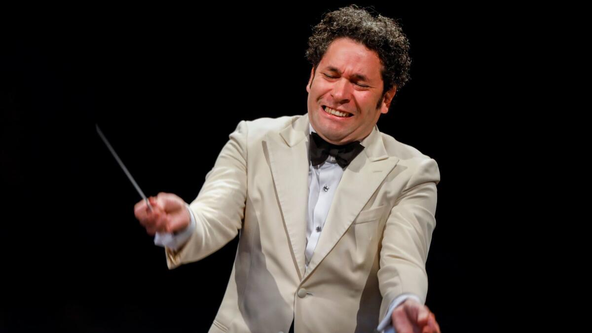Gustavo Dudamel leads "The Planets," with the L.A. Philharmonic, at the Hollywood Bowl on Tuesday night.
