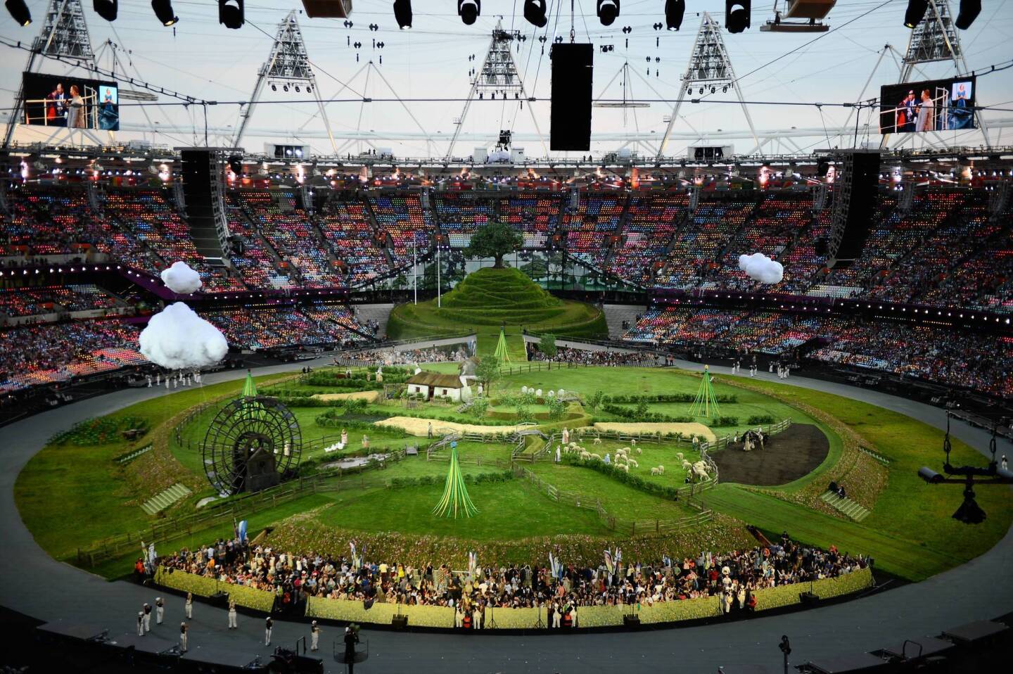The stadium is is set with a British meadow scene for the opening ceremony of the London 2012 Olympic Games at the Olympic stadium in London.