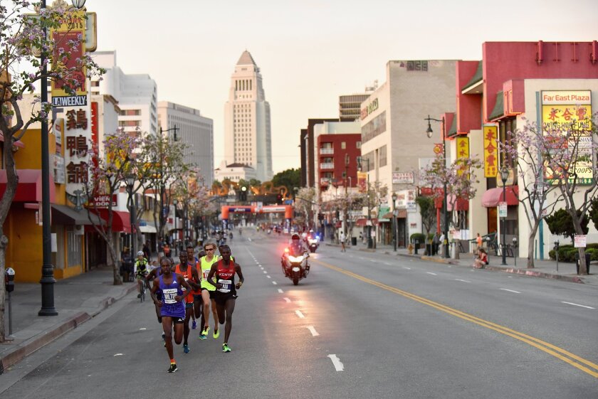 LOS ANGELES, CA - MARCH 15: Milton Kiplagat Rotich of Kenya leads a pack of runners during the 2015 ASICS LA Marathon on March 15, 2015 in Los Angeles, California. (Photo by Jonathan Moore/Getty Images) ** OUTS - ELSENT, FPG - OUTS * NM, PH, VA if sourced by CT, LA or MoD **