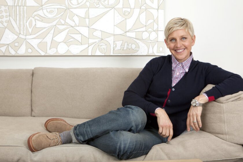 Ellen DeGeneres announced on Twitter on Friday that she will host next year's Oscars. Above, DeGeneres sits in her Warner Bros. studio dressing room in Burbank.