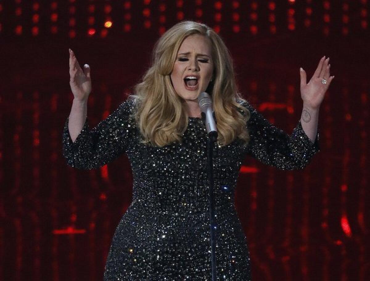 Adele sings the Oscar-winning original song "Skyfall" at last year's Academy Awards ceremony. While signed to Columbia Records in America, she is on the British indie XL in her home country.