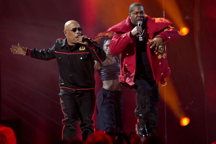 Spliff Star, left, and Busta Rhymes perform "Put Your Hands Where My Eyes Could See" at the 65th annual Grammy Awards on Sunday, Feb. 5, 2023, in Los Angeles. (AP Photo/Chris Pizzello)