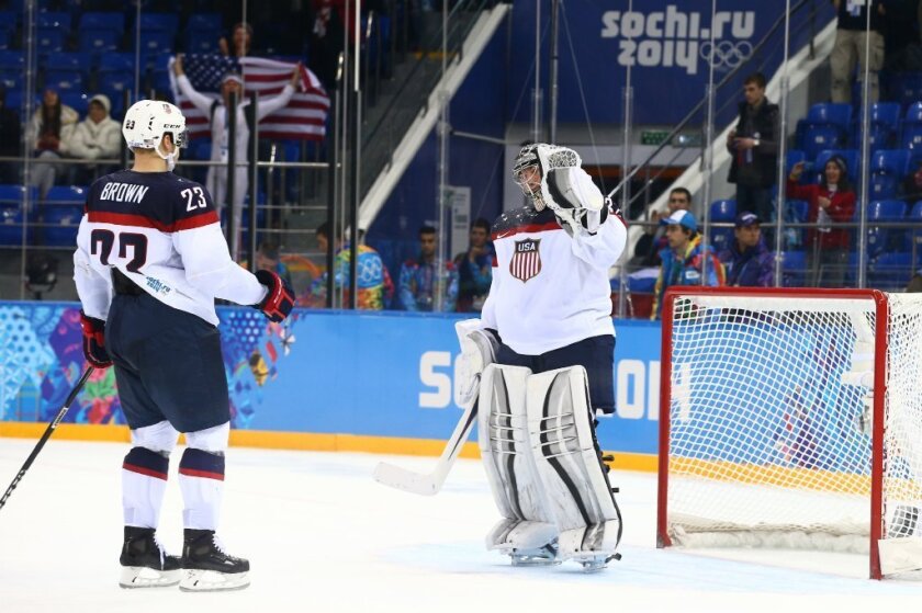 U.S. and Kings teammates Dustin Brown and Jonathan Quick celebrate their team's 5-2 victory over the Czech Republic.