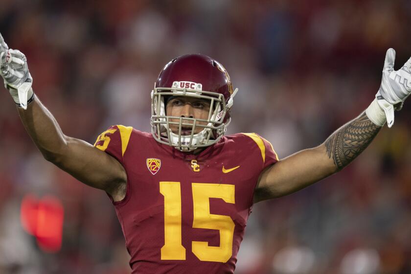 USC safety Talanoa Hufanga celebrates against Utah on Sept. 20, 2019 at the Coliseum.