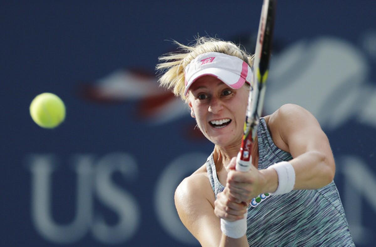 Alison Riske returns a shot against Daniela Hantuchova during a fourth-round match at the U.S. Open on Monday.