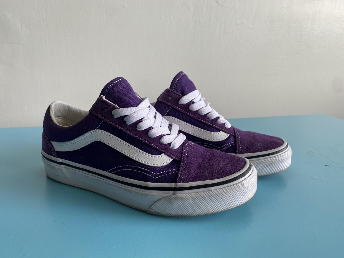 A pair of purple Vans Old Skool sneakers.