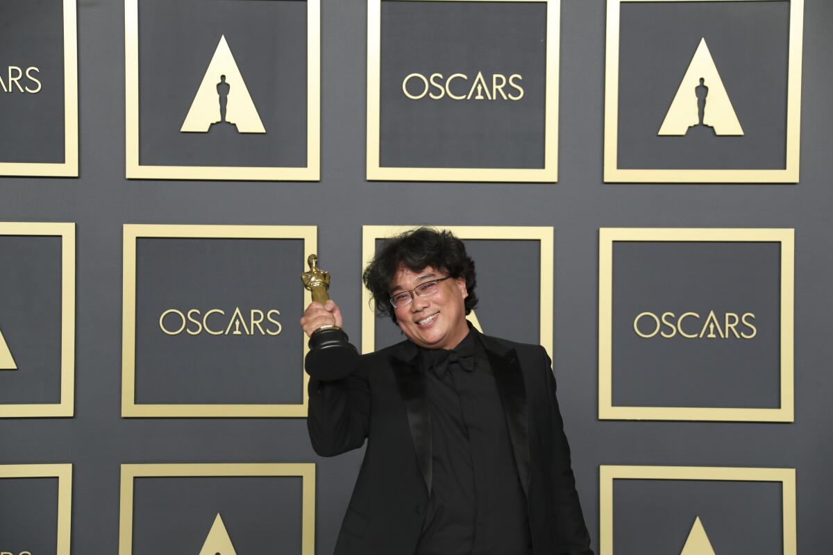 Bong Joon Ho with his 2020 Oscar for best director