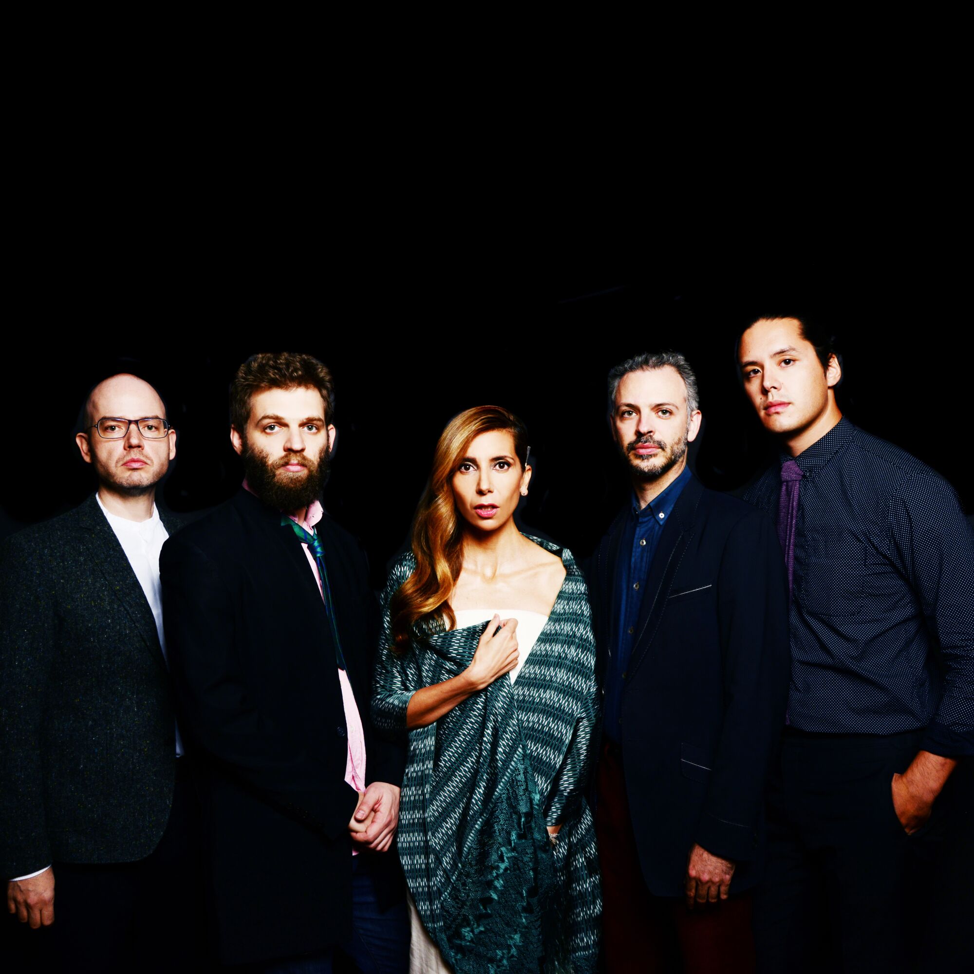 Magos Herrera, center, with the Brooklyn Rider string quartet
