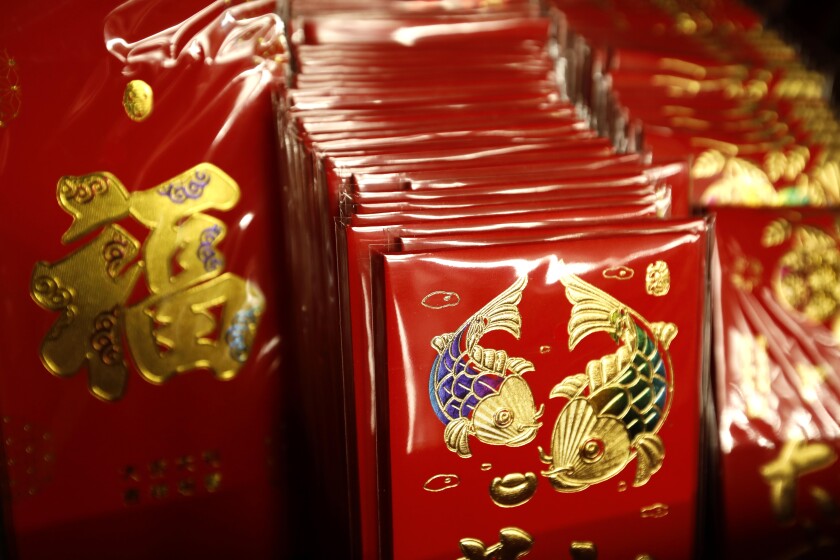 Lunar New Year Red Envelopes Yield Much More Than Cash Los Angeles Times