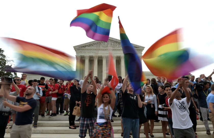 The historic decision on same-sex marriage prompts celebrations outside the Supreme Court.