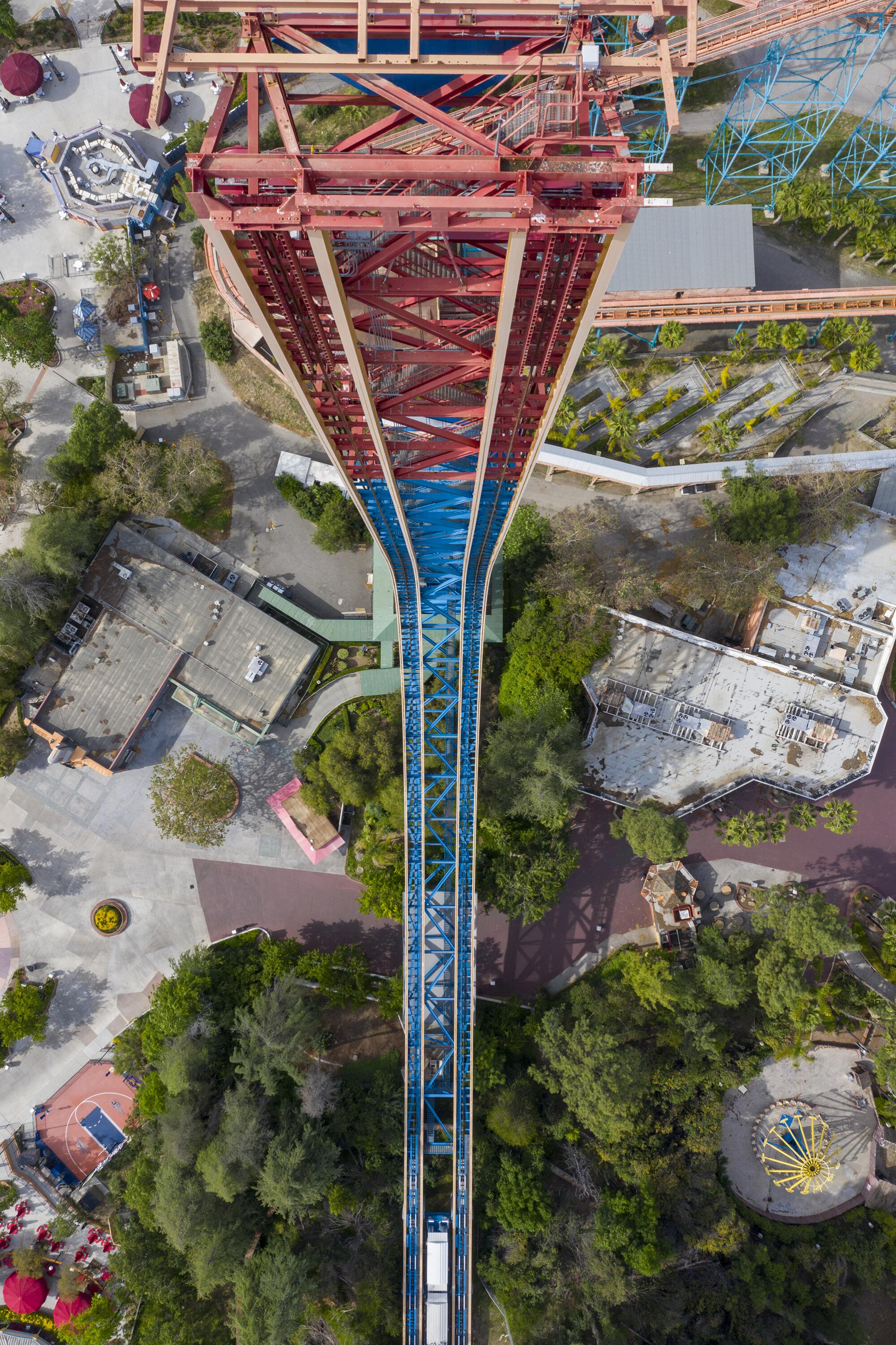 The Superman roller coaster at Six Flags Magic Mountain peaks at 415 feet and reaches a top speed of 104 mph.