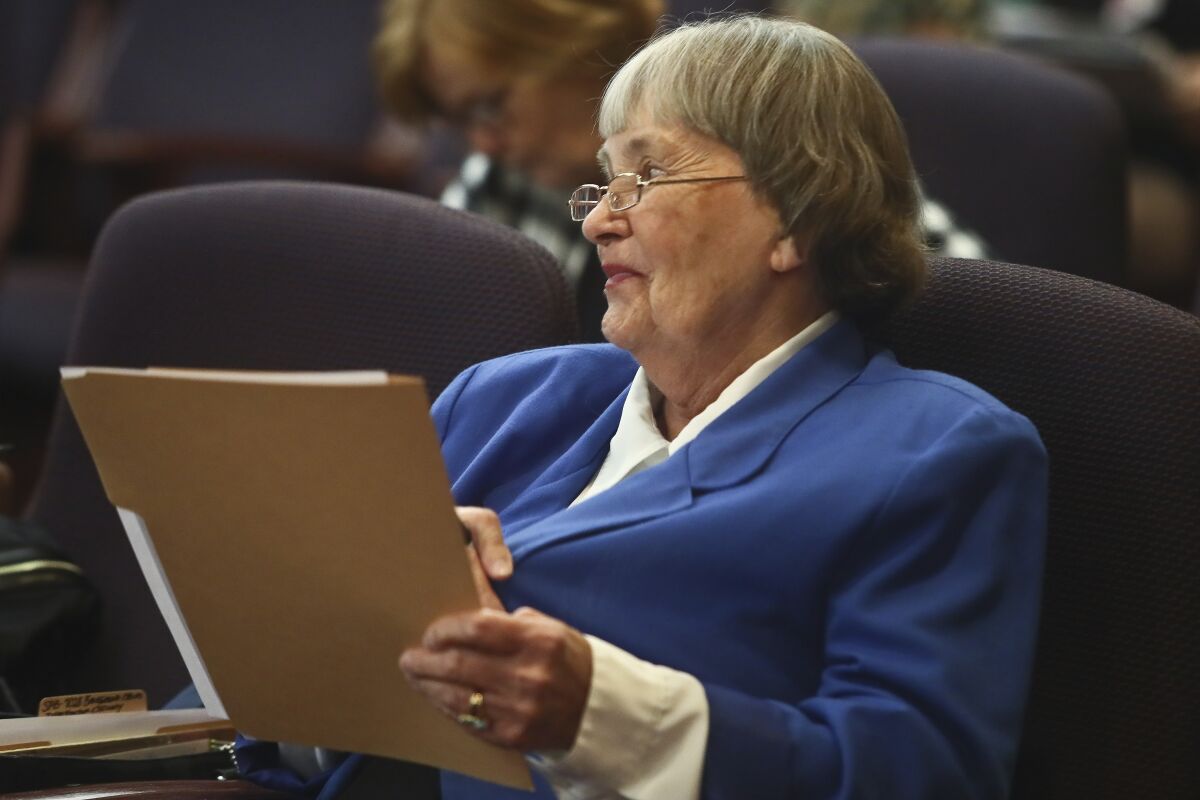 Florida National Rifle Association lobbyist Marion Hammer listens Jan. 13, 2020, during a Senate Infrastructure and Security Committee meeting at the Capitol in Tallahassee, Fla. The National Rifle Association says its longtime lobbyist in Florida, Marion Hammer, will retire but remain an advisor to the organization. Hammer was also the first female NRA president from 1996 to 1998. She said in a statement Thursday, June 16, 2022 she served the gun rights group for 44 years and that she was proud of her record on Second Amendment issues. (AP Photo/Phil Sears, file)