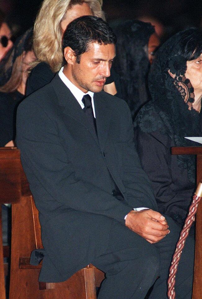 Antonio D'Amico was the partner of Italian fashion designer Gianni Versace. In this photo, D'Amico attended the memorial service for Versace inside Milan's gothic cathedral.