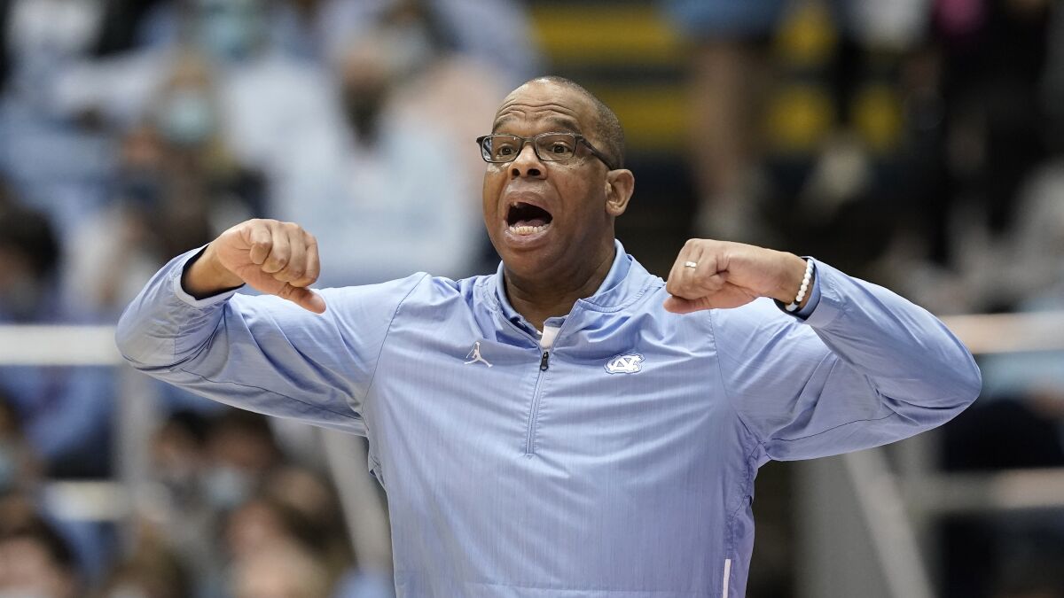 North Carolina head coach Hubert Davis reacts during the second half of an NCAA college basketball game against Loyola Maryland in Chapel Hill, N.C., Tuesday, Nov. 9, 2021. (AP Photo/Gerry Broome)