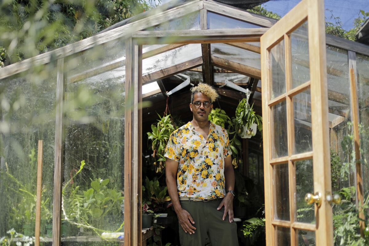 Hank Jenkins in his greenhouse.