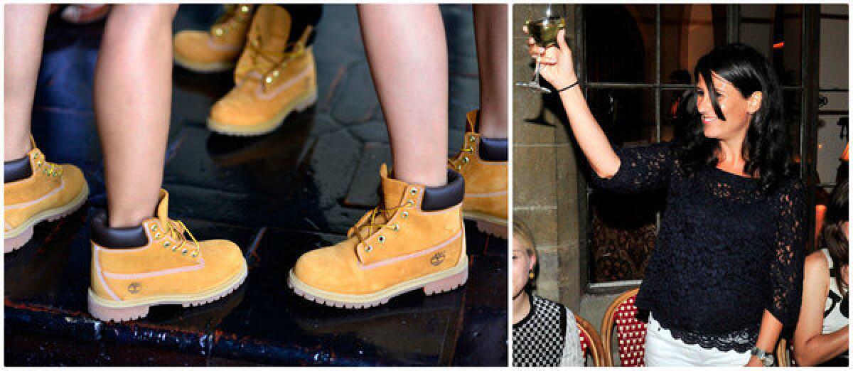 Timberland's Rachel Panetta, right, lifts a glass in honor of the 40th birthday of the brand's iconic yellow boot, which was out in full force, left, at a heritage dinner at the Chateau Marmont in West Hollywood.