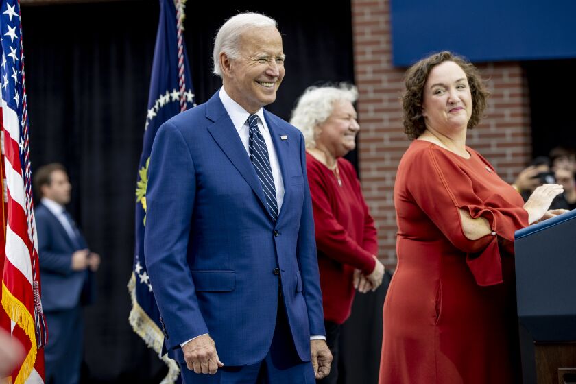 IRVINE, CA - OCTOBER 14, 2022: U.S. Rep. Katie Porter (D-CA) introduces President Joe Biden to speak to supporters about lowering costs for Americans at Irvine Valley College on October 14, 2022 in Irvine, California.(Gina Ferazzi / Los Angeles Times)