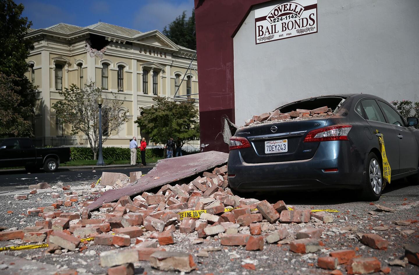 A car is seen covered in bricks following a reported 6.0 earthquake on August 24, 2014 in Napa, California.