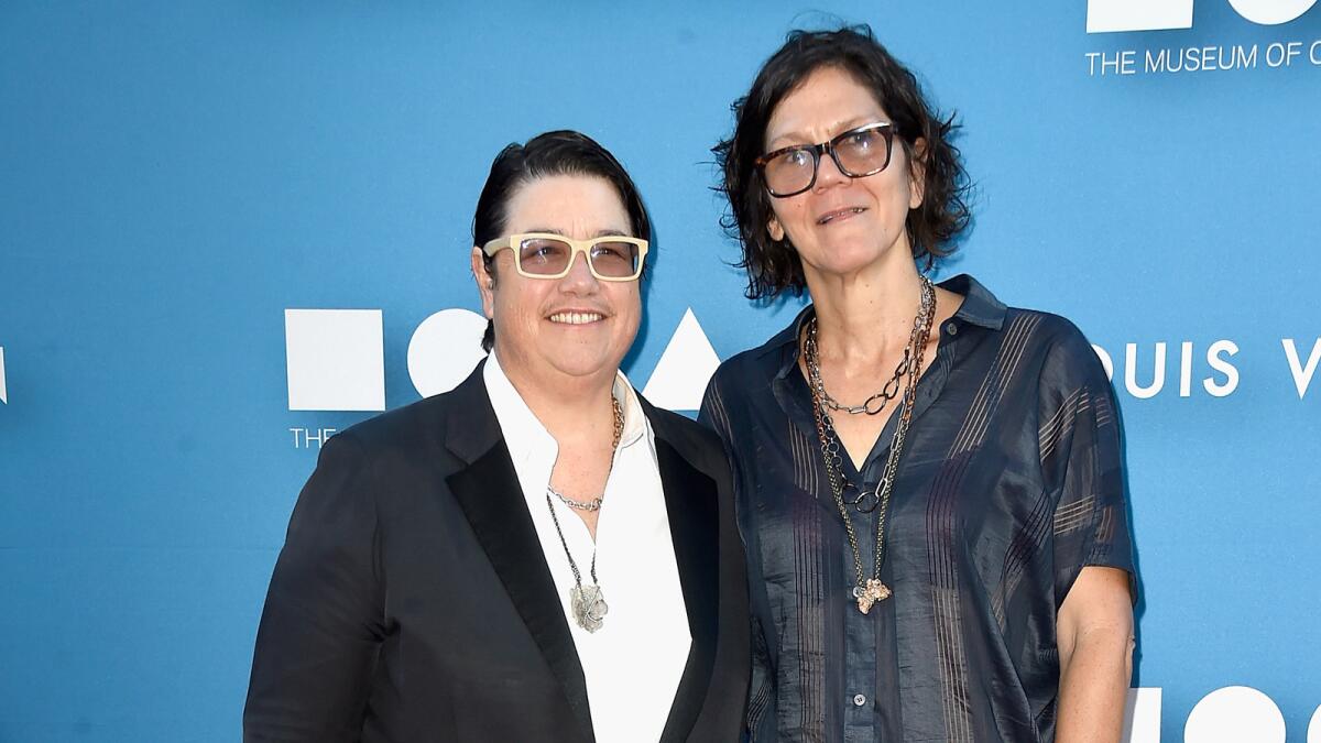Catherine Opie, left, and Julie Burleigh had to defer their wedding for years because of Prop. 8.
