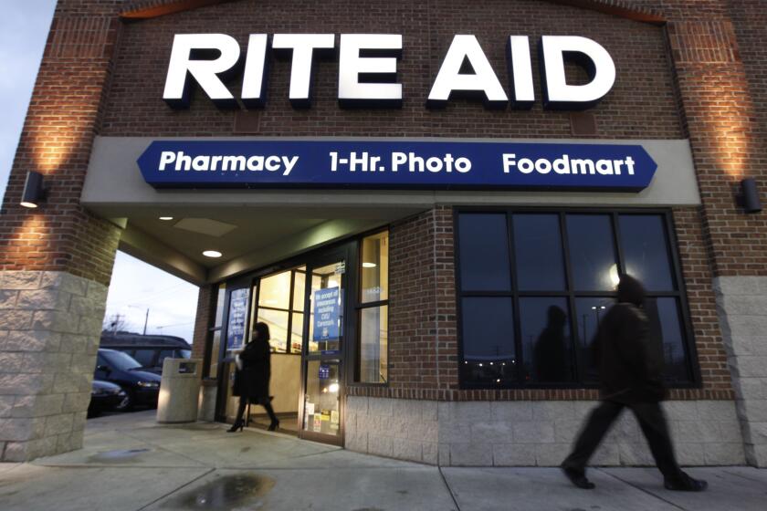 Rite Aid shares climbed after a report that Walgreens agreed to buy the drugstore chain.