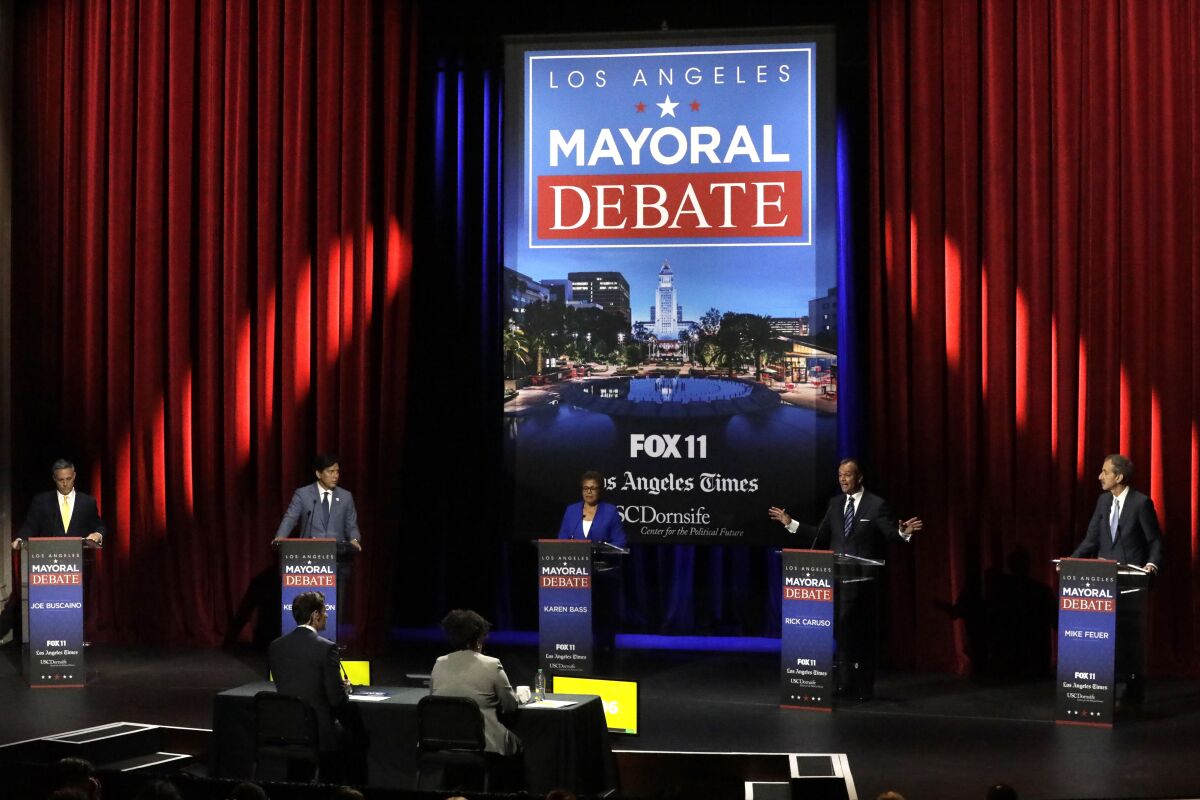 Candidates participate in a mayoral debate at USC on  March 22, 2022.