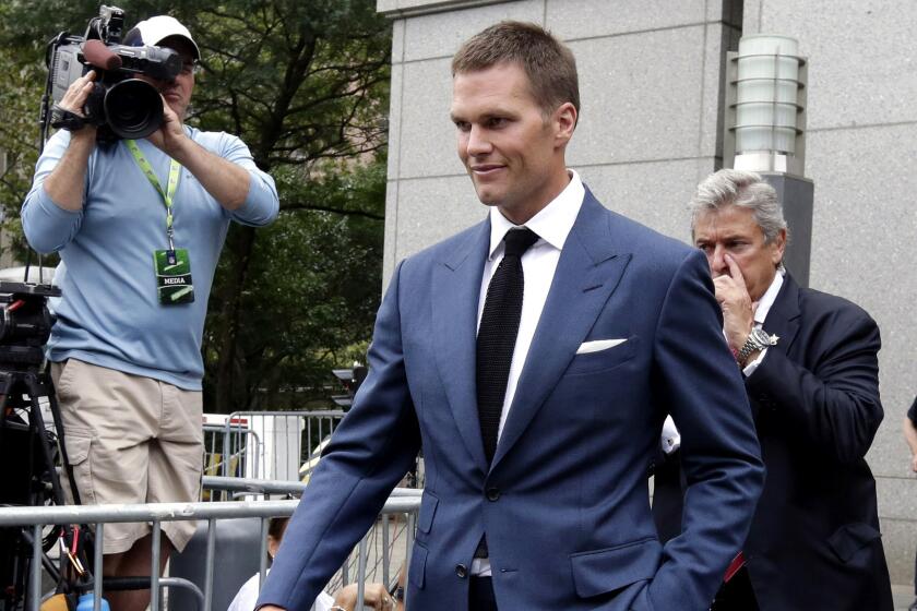 Patriots quarterback Tom Brady leaves federal court in New York after a proceeding on Aug. 31, 2015.
