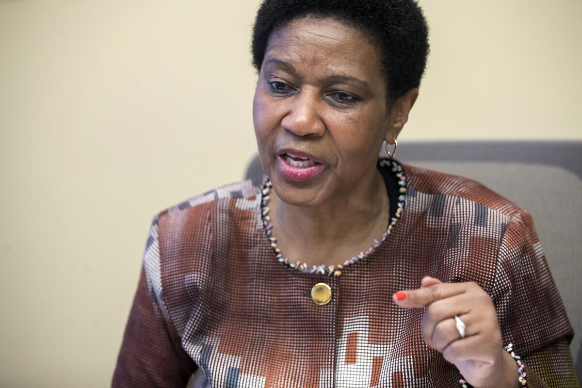FILE - In this Wednesday, March 7, 2018 file photo, Phumzile Mlambo-Ngcuka, United Nations Under-Secretary-General and Executive Director of U.N. Women, speaks during an interview with The Associated Press, in New York. The U.N. health agency and its partners have found in a new study released Tuesday, March 9, 2021 that nearly one in three women worldwide have experienced physical or sexual violence in their lifetimes, calling the results a “horrifying picture” that requires action by government and communities alike. Phumzile Mlambo-Ngcuka, executive director of UN Women, called violence against women "the most widespread and persistent human rights violation that is not prosecuted.” (AP Photo/Mary Altaffer, file)