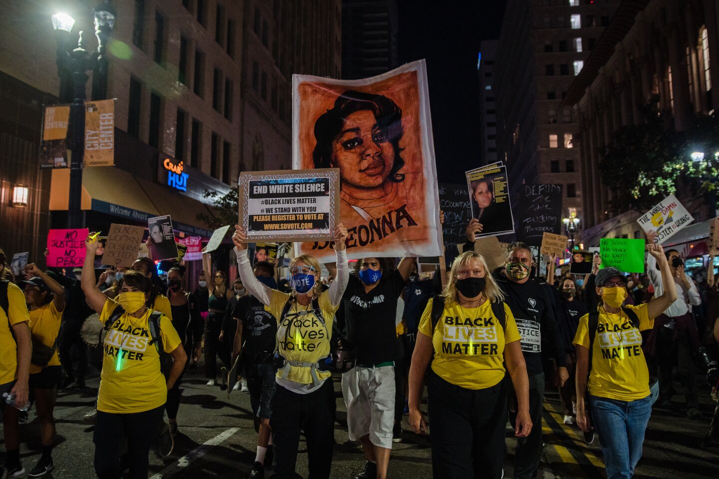 Protesters march through the streets of downtown San Diego on September 23, 2020 after a grand jury in Kentucky declined to bring homicide charges against officers in the death of Breonna Taylor.