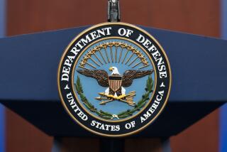 FILE - The seal of the Department of Defense is seen on the podium at the Pentagon, Sept. 27, 2022, in Washington. President Joe Biden will sign an executive order that gives decisions on the prosecution of serious military crimes, including sexual assault, to independent military attorneys, taking that power away from victims' commanders. (AP Photo/Alex Brandon, File)