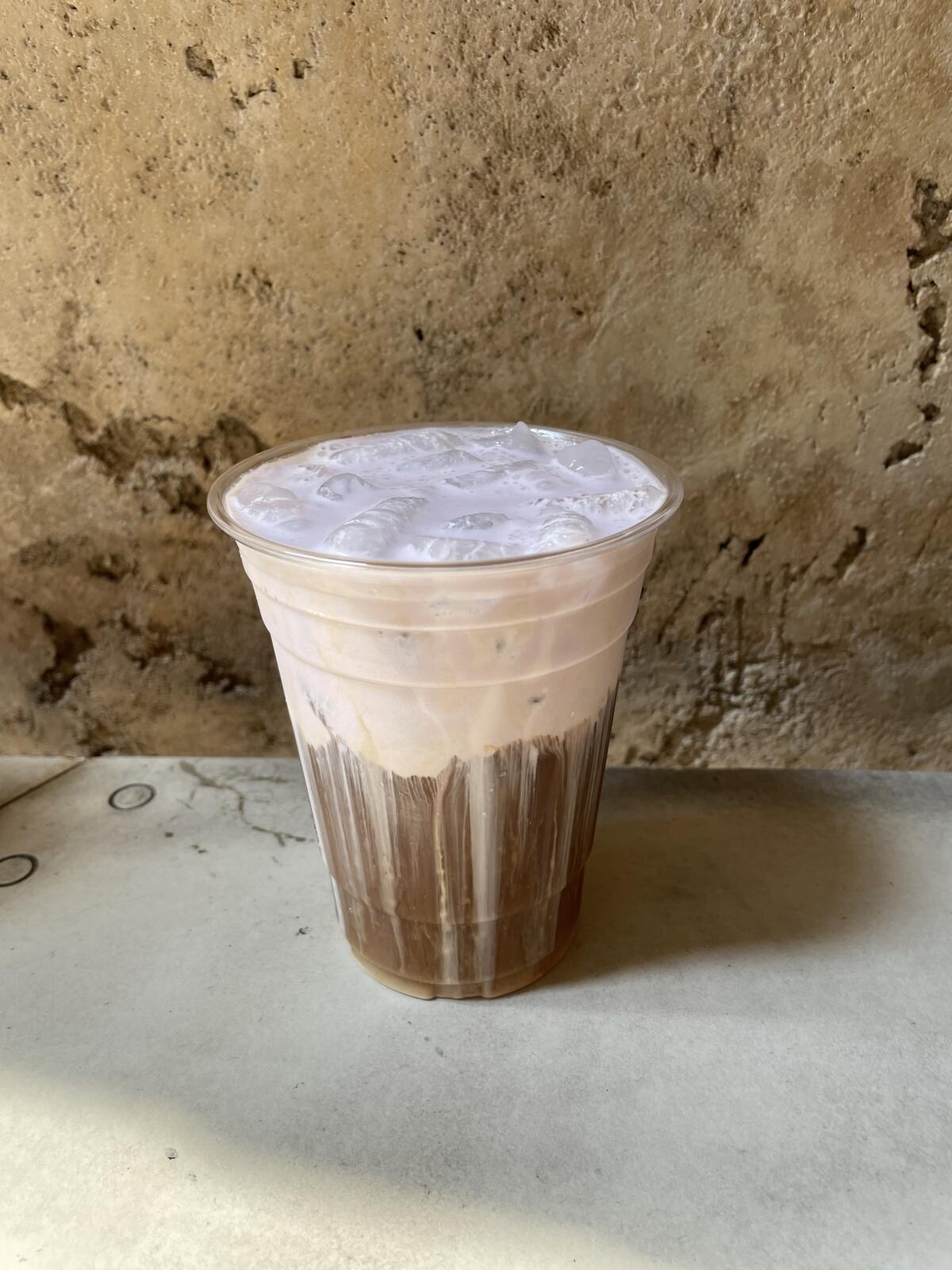 A Cold Brew Black Caf with Taro Topper at Docking Bay 7 Food and Cargo inside Star Wars: Galaxy's Edge at Disneyland.