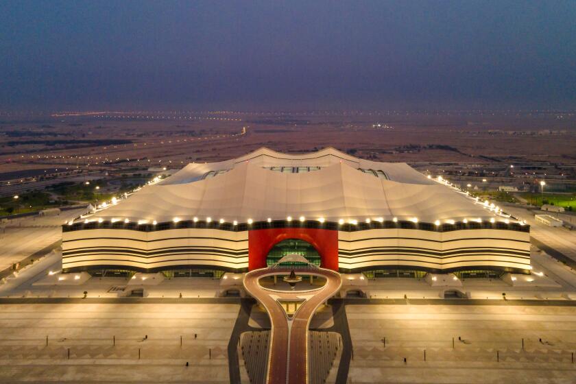AL KHOR, QATAR - JUNE 19: (EDITORS NOTE: This photograph was taken using a drone) An aerial view of Al Bayt at sunrise on June 19, 2022 in Al Khor, Qatar. Al Bayt stadium will host the opening game of the FIFA World Cup Qatar 2022 starting in November. The stadium, designed by the studio Dar Al-Handasah, takes its name from bayt al sha'ar - tents historically used by nomadic people in Qatar and the Gulf region. (Photo by David Ramos/Getty Images)