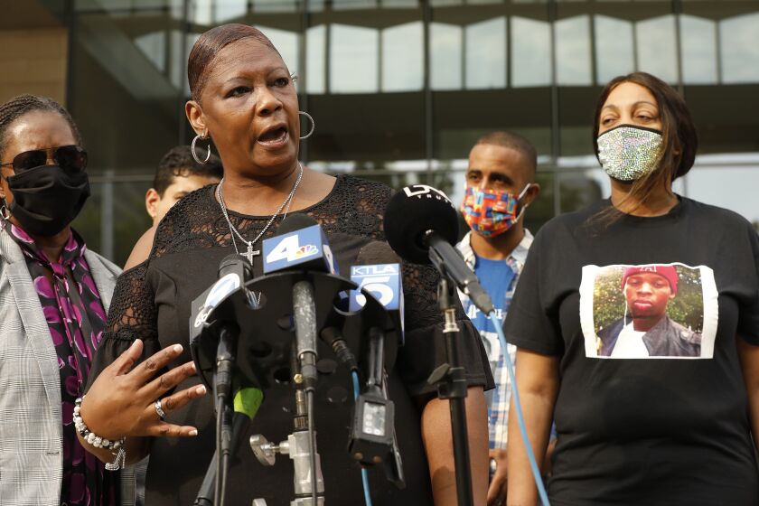 LOS ANGELES, CA - JULY 13: Joyce Jackson, left, sister of Timothy Dean who died in 2019 with LaTisha Nixon, right, Mother of Gemmel Moore, who died in 2017 in the West Hollywood apartment of Ed Buck addresses a press conference with survivors, family members of victims, and their attorneys on Tuesday, July 13 as jury selection begins for the federal criminal trial for Ed Buck at the United States District Court for the Central District of California in downtown Los Angeles. Democratic donor Ed Buck is facing two counts of distribution of controlled substances resulting in death. One count for the 2017 death of 26-year-old Gemmel Moore and one for the death of Timothy Dean in 2019. If convicted, each charge carries a twenty year mandatory minimum. United States District Court for the Central District of California on Tuesday, July 13, 2021 in Los Angeles, CA. (Al Seib / Los Angeles Times).