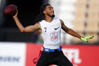 Fighting Cancer's Darrell Doucette passes during a semifinal round game at the AFFL U.S. Open of Football tournament