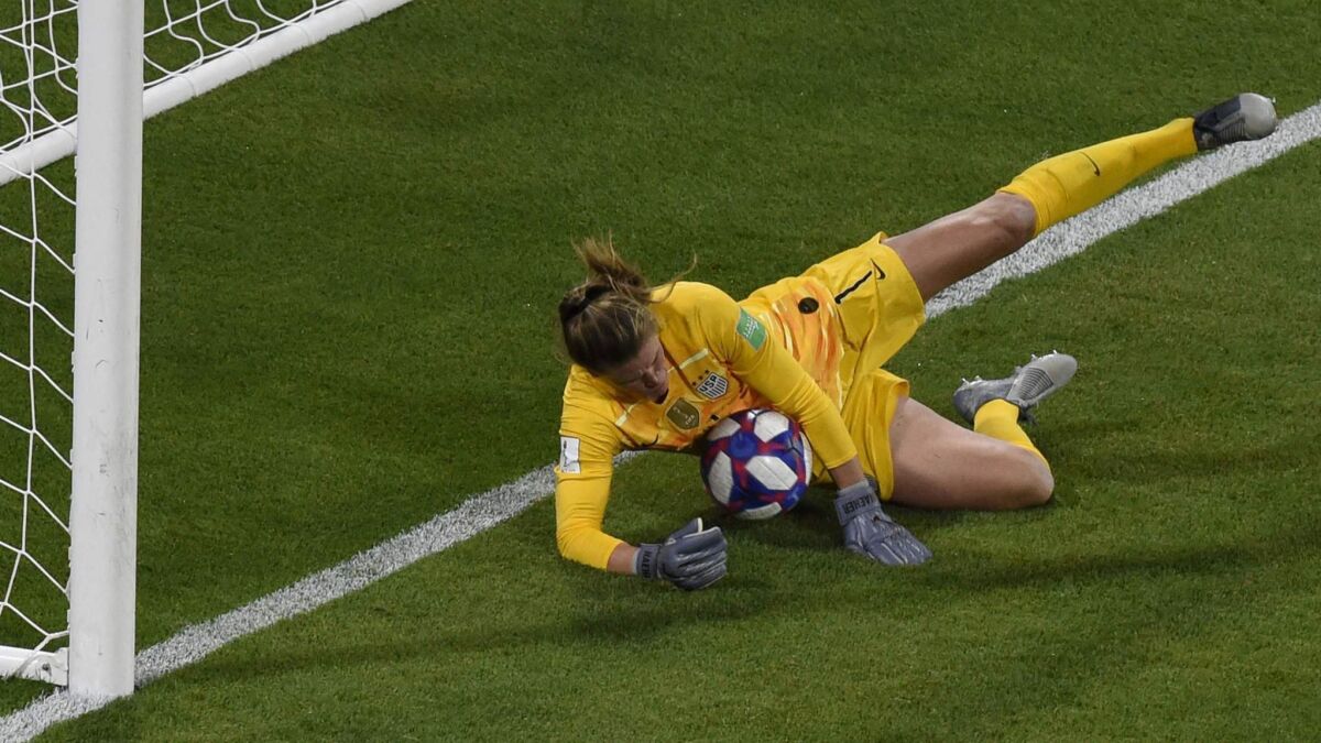 U.S. goalkeeper Alyssa Naeher makes a save on an England penalty kick during the Women's World Cup semifinals on Tuesday.