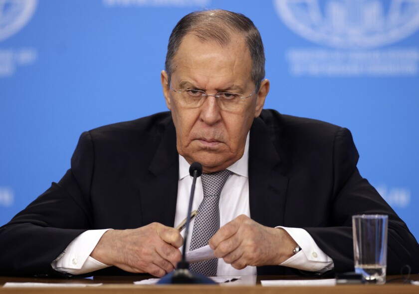 Russian Foreign Minister Sergey Lavrov attends his annual news conference in Moscow, Russia, Friday, Jan. 14, 2022. (Dimitar Dilkoff/Pool Photo via AP)