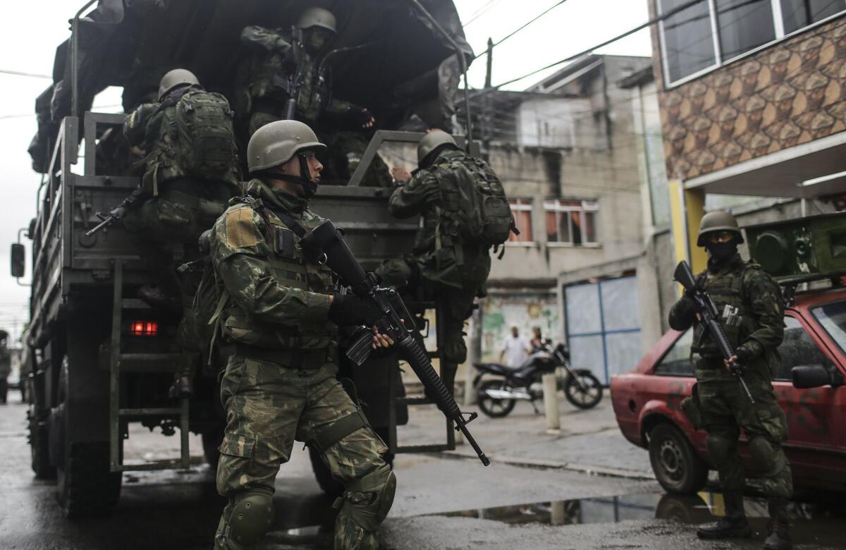 Soldiers participate in a security operation in Rio de Janeiro. Some 3,200 soldiers returned to the streets in an operation against organized crime.
