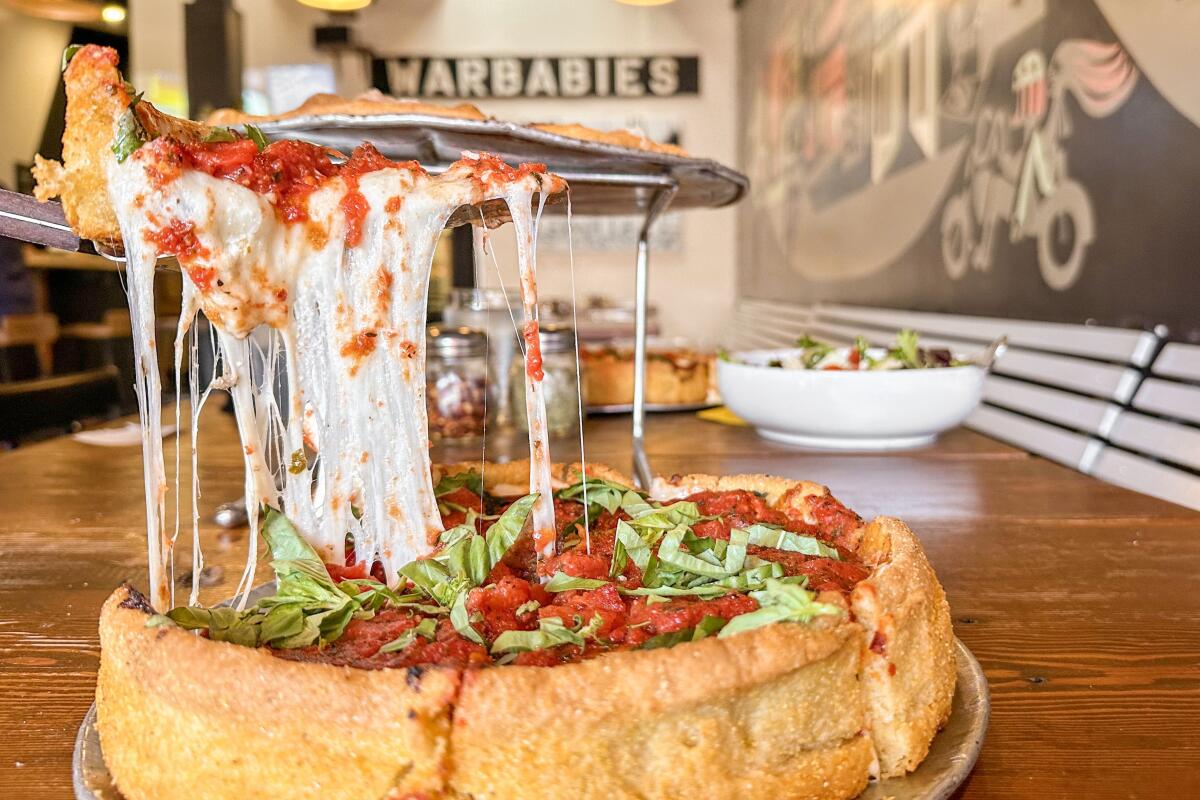 Chicago-style deep dish pizza with meatball at Blackbird Pizza Shop.