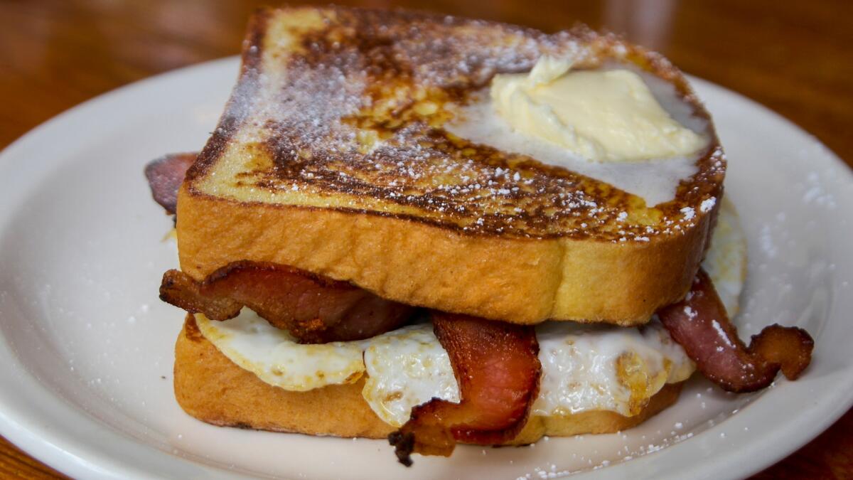 Butter melts on the French toast sandwich at Rocky's Cafe in Felton.