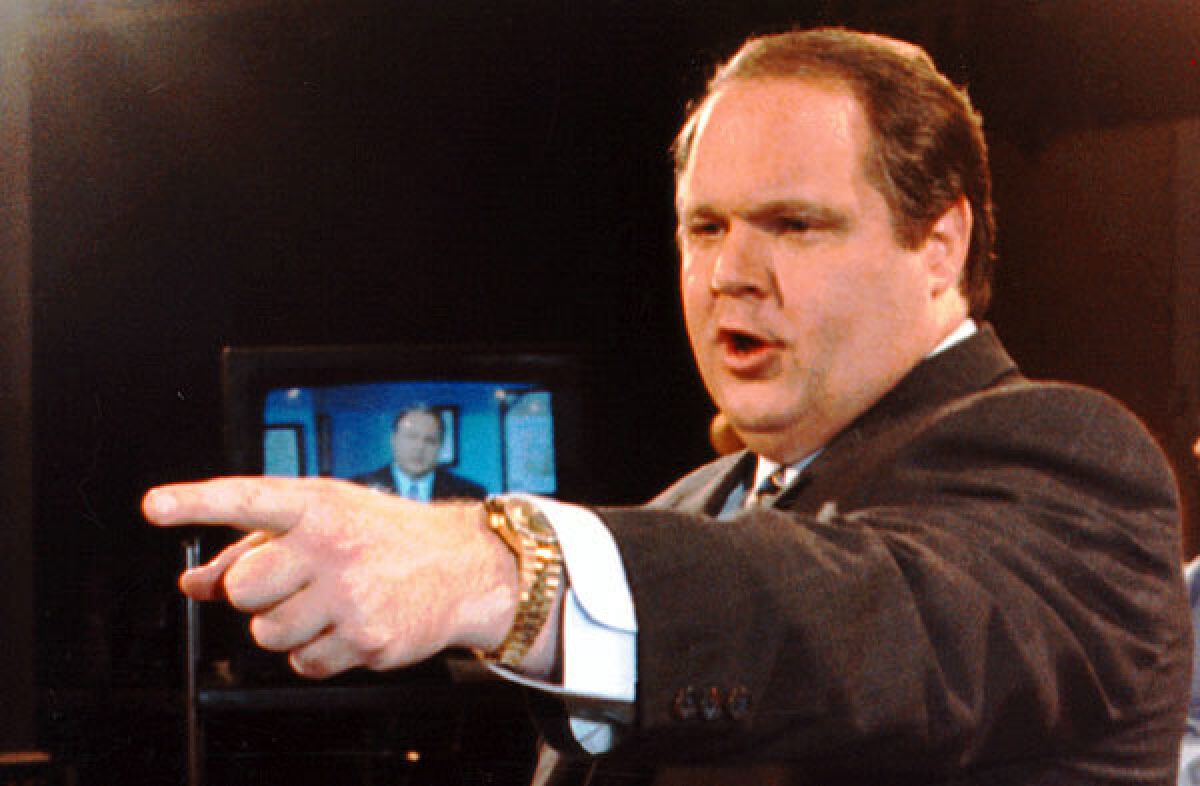 Rush Limbaugh points his finger.