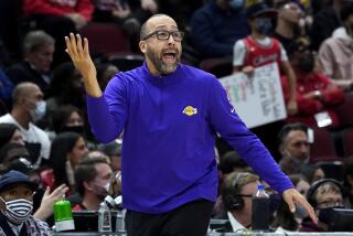 Los Angeles Lakers assistant coach David Fizdale talks to his team during the second half.