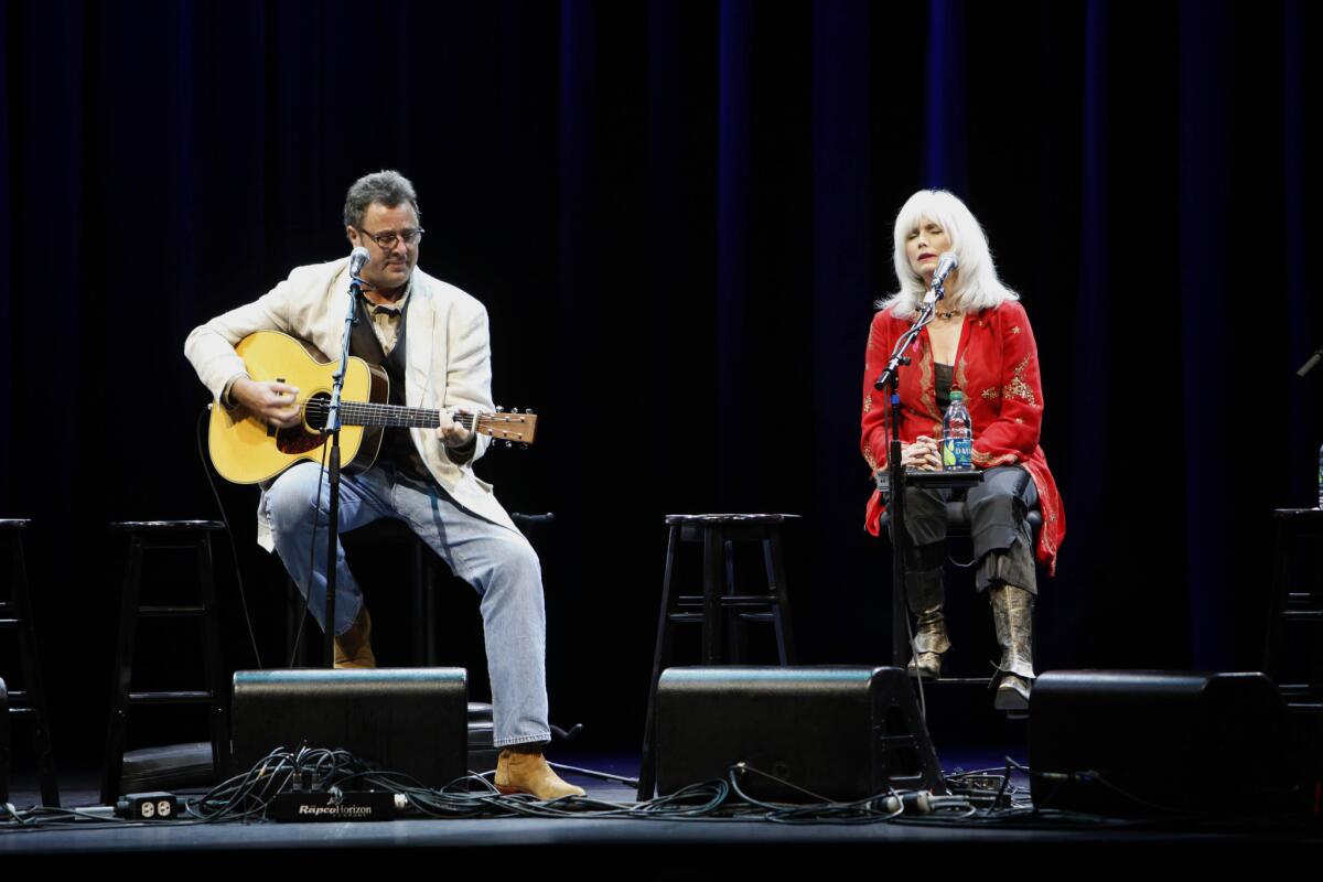 Vince Gill and Emmylou Harris, during the 2011 performance in Los Angeles, will be joined by Heart and Jason Mraz on March 4 for the annual All For the Hall concert benefiting the Country Music Hall of Fame and Museum in Nashville.