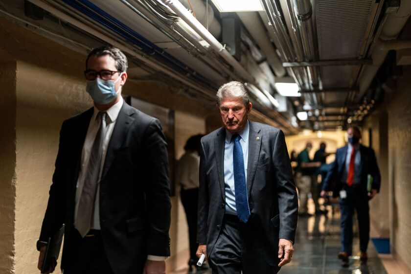 WASHINGTON, DC - DECEMBER 15: Sen. Joe Manchin (D-WV) leaves a meeting with other Senate leaders, on Capitol Hill on Wednesday, Dec. 15, 2021 in Washington, DC. (Kent Nishimura / Los Angeles Times)