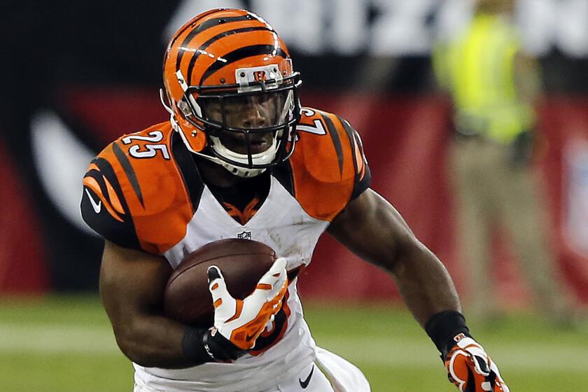 Cincinnati Bengals running back Giovani Bernard carries the ball during a preseason game against the Arizona Cardinals on Aug. 24. Bernard could see an enhanced role in the Bengals' offense this season.