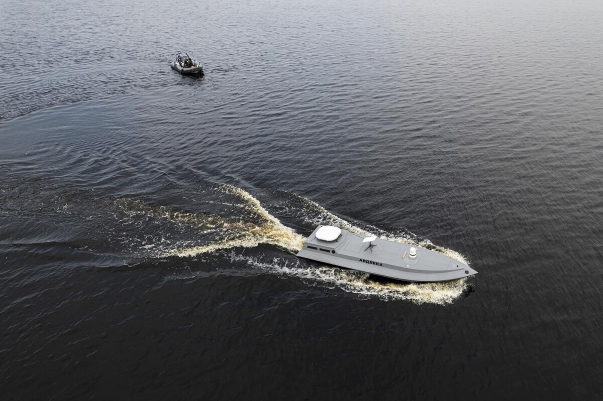 A sea drone cruises on the water.