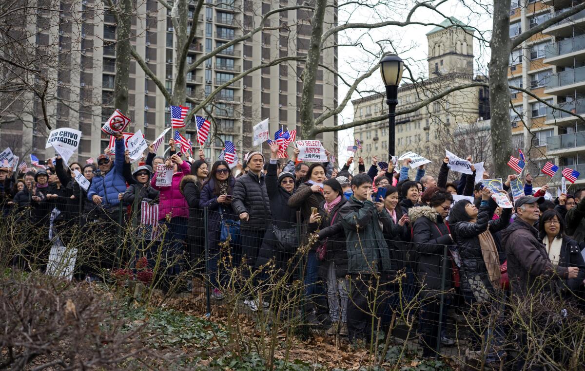 Protesters in Brooklyn, N.Y., in February show support for former NYPD Officer Peter Liang.
