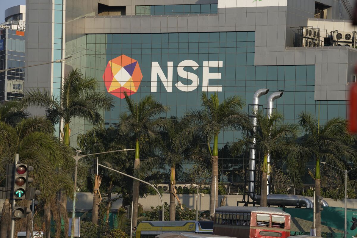 The National Stock Exchange of India (NSE) building is seen in Mumbai, India, Monday, Feb.14, 2022. The former chief of India’s largest stock exchange was fined nearly $400,000 after a probe found she had shared confidential information with an unnamed guru who regulators say influenced her decision-making. (AP Photo/Rafiq Maqbool)